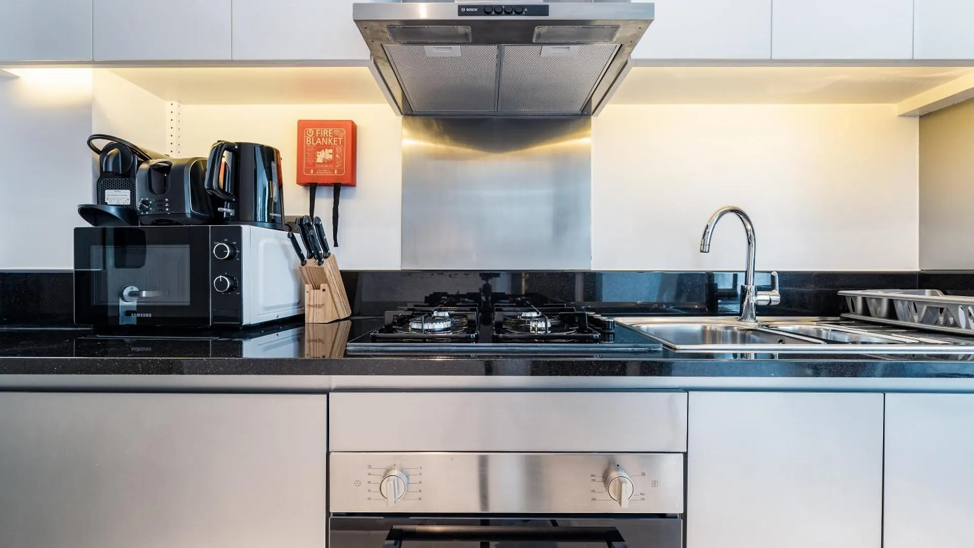 A Living Stylish Studio Apartment With Partial Burj & Canal View At Prive B 1417 Дубай