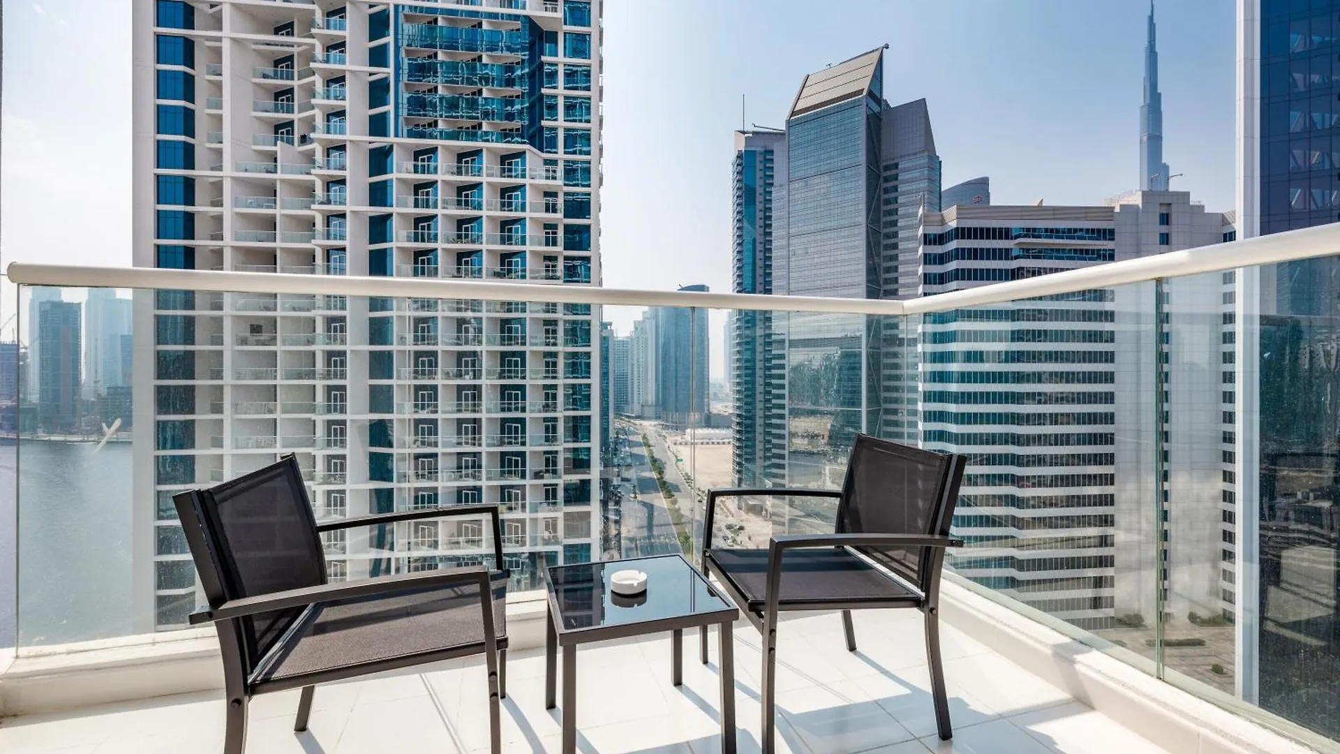 A Living Stylish Studio Apartment With Partial Burj & Canal View At Prive B 1417 Дубай